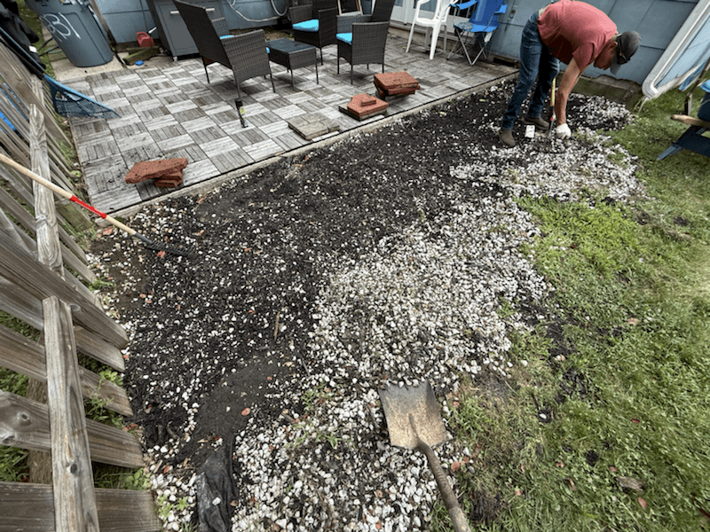 Backyard patio area under preparation before the finished improvement