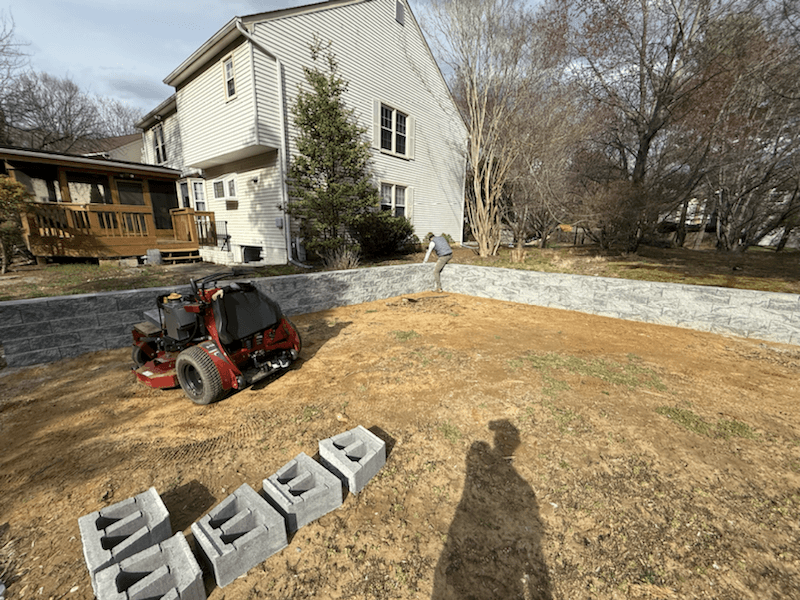 Finished retaining wall and graded area