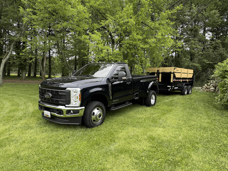 Modesta Landscaping work truck and trailer
